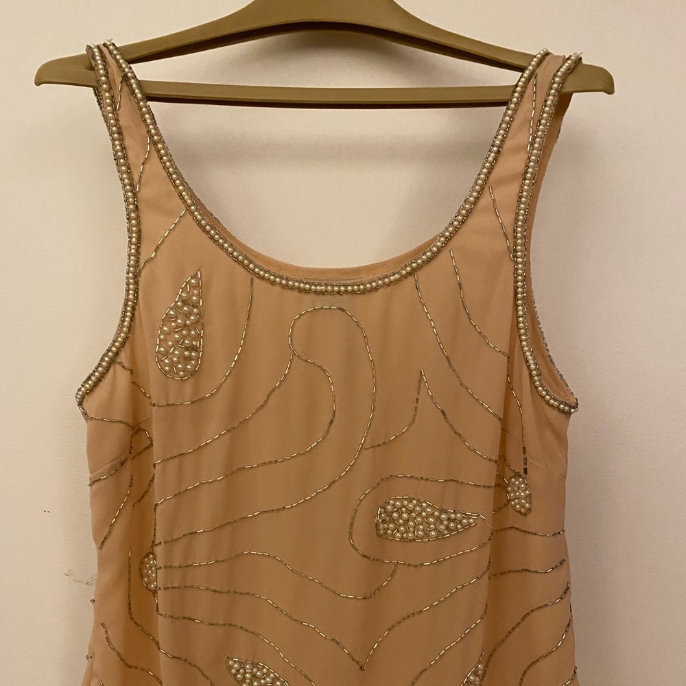 Beaded tank top, new without tags.